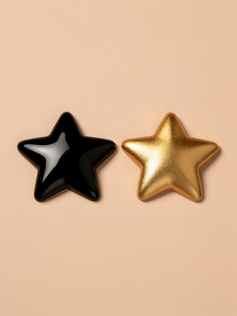Star Nipple Pasties in black and gold